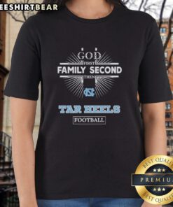 Alt Text: Official North Carolina Tar Heels 'God First, Family Second, Then Tar Heels' football ladies tee shirt design.