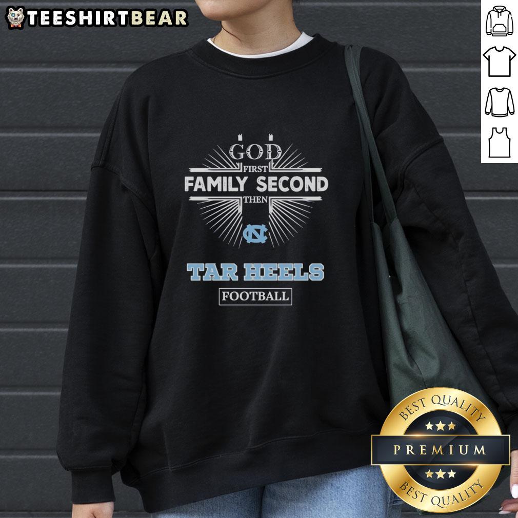 Official North Carolina Tar Heels sweatshirt with 'God First, Family Second, Then Tar Heels Football' slogan.