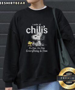 Alt Text: Official Snoopy and Woodstock X Chili's sweatshirt with 'I Work At It's Fine I'm Fine Everything Is Fine' design.