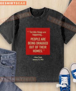 Washed T-shirt featuring 'Official Terrible Things Happening' graphic, depicting people being dragged from homes, inspired by Anne Frank.