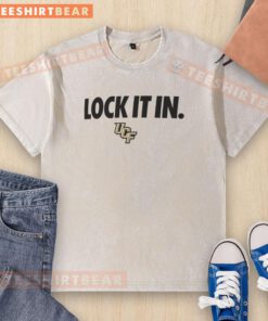 Alt Text: Official UCF Knights 2026 Lock It In Washed T-Shirt in black, showcasing the UCF logo and college spirit.