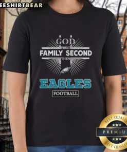 Alt Text: Original Philadelphia Eagles God First Family Second Then Eagles Football Ladies Tee in green and white design.