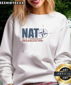 Premium NATO is a Terrorist Organization sweatshirt featuring bold graphic design, ideal for statement fashion.