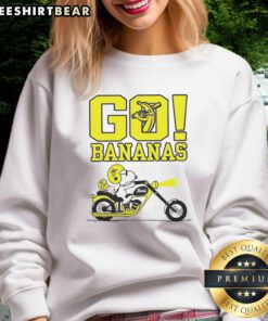 Premium Snoopy and Woodstock driving in Savannah, featuring a fun bananas design on a cozy sweatshirt.