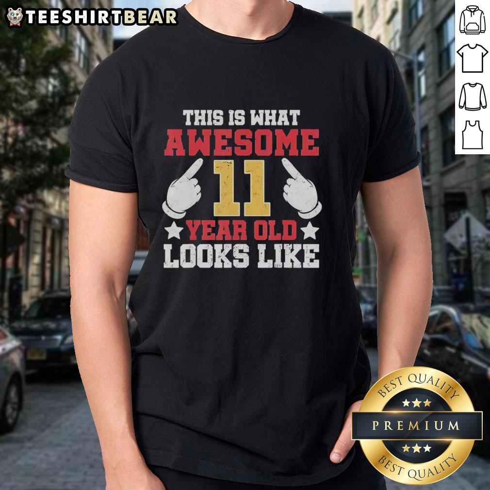 Premium 'This Is What Awesome 11 Year Old Looks Like' T-Shirt design featuring bold text and vibrant colors for kids.