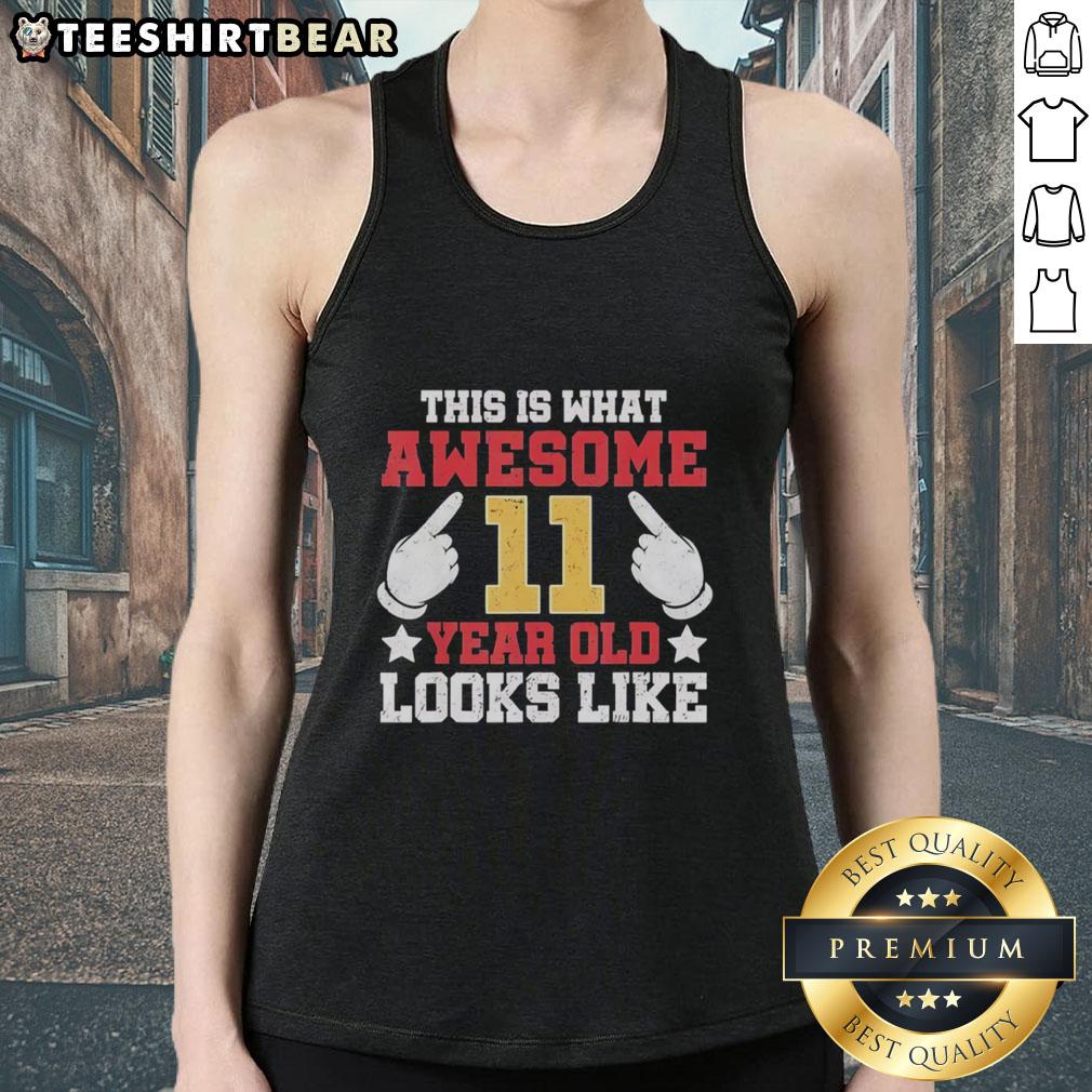 11-year-old wearing a stylish tank top with 'This Is What Awesome Looks Like' graphic, showcasing youthful confidence.