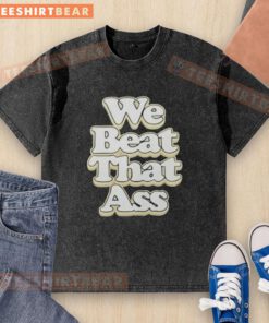 Premium USF Men We Beat That Ass Washed T-Shirt in vibrant green, showcasing a bold graphic for stylish casual wear.