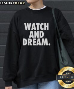 Premium watch and Dream sweatshirt displayed together, showcasing stylish fashion and luxury accessories for casual wear.