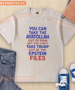 Premium washed t-shirt featuring 'You Can Take The Ayatollah Out Of Iran But You Can't Take Trump Out Of The Epstein Files' design.