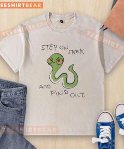 Pretty snake graphic on a washed t-shirt featuring 'Step On Snek And Find Out' text, perfect for casual wear.