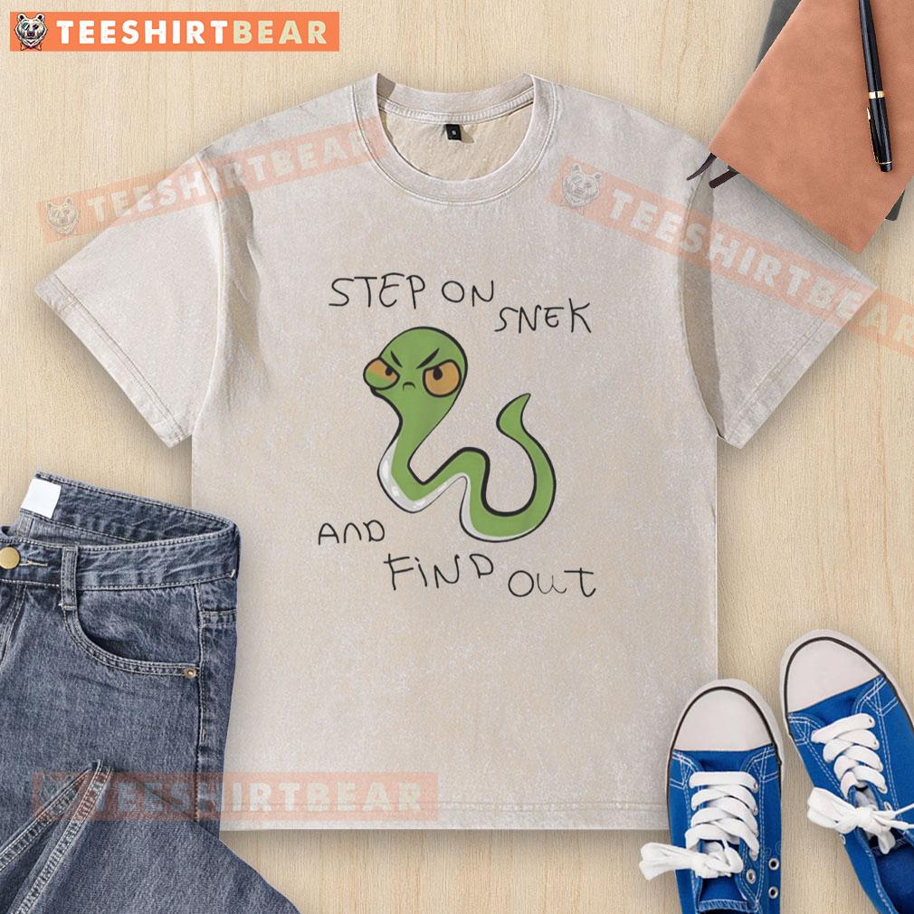 Pretty snake graphic on a washed t-shirt featuring 'Step On Snek And Find Out' text, perfect for casual wear.