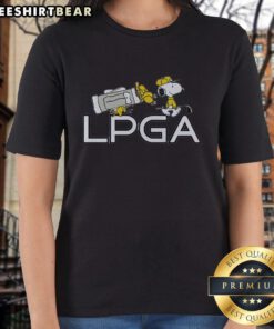 Alt Text: Pretty Snoopy and Woodstock holding a pocket golf tee from Peanuts X LPGA for ladies' golf enthusiasts.