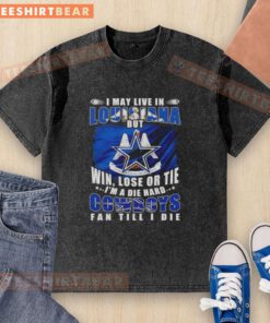 Die-hard Dallas Cowboys fan wearing a washed T-shirt that says 'I may live in Louisiana but I'm a Cowboys fan.'