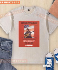 Top Jesse Welles Red Tour 2026 North America city dates poster on a washed t-shirt, showcasing vibrant design and tour info.