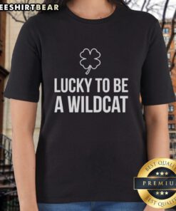 Alt Text: Top Lucky to Be a Wildcat St. Patrick's Day ladies tee featuring green design and festive shamrocks.