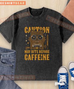 Top May Bite Before Caffeine washed t-shirt showcasing a stylish design for coffee lovers and casual wear enthusiasts.