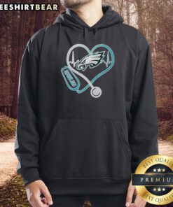 Top Nurse Heartbeat hoodie featuring Philadelphia Eagles logo, perfect for fans and healthcare professionals.