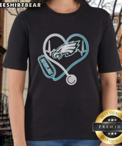 Top Nurse Heartbeat X Philadelphia Eagles Logo Ladies Tee showcasing a stylish design for Eagles fans and nurses.