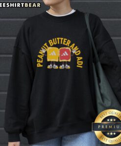 Top Peanut Butter and Adi Adidas sweatshirt featuring a trendy design and vibrant colors, perfect for casual wear.