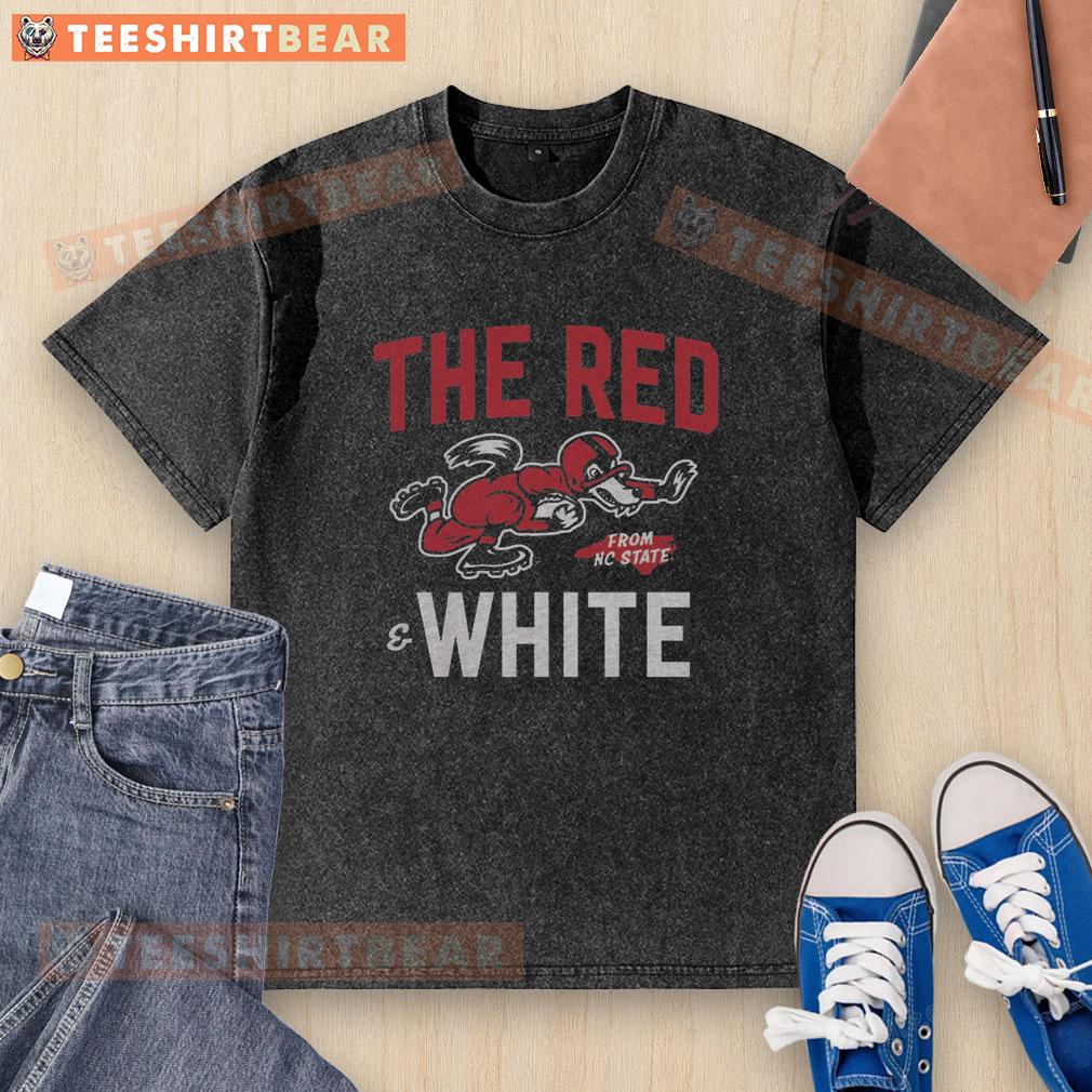 Top view of a red and white NC State football washed t-shirt, showcasing team spirit and style for fans.