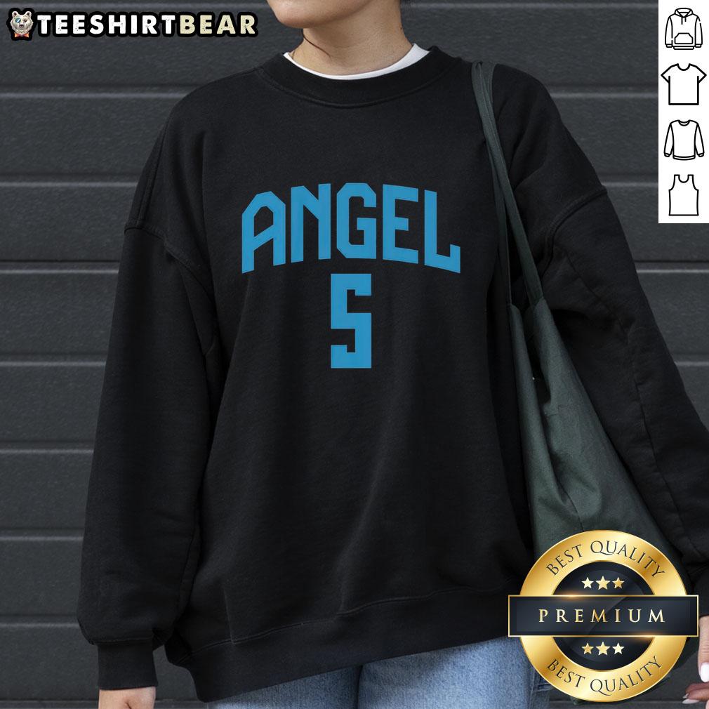 Angel Reese wearing an Atlanta Dream sweatshirt, showcasing stylish sports apparel for fans and athletes.