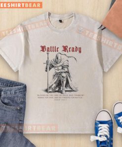 Battle-ready Psalm 144:1 Christian washed t-shirt featuring bold graphics for faith-inspired fashion.