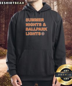 Awesome Bowling Green Hot Rods hoodie under summer night lights at the ballpark, perfect for fans and cozy evenings.