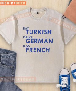 Awesome Eat Turkish Drive German Kiss French washed T-shirt displayed on a hanger, featuring vibrant graphic design.