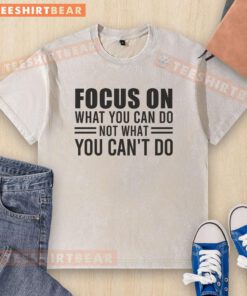 Motivational mindset washed t-shirt featuring 'Focus On What You Can Do' design for inspiration and positivity.