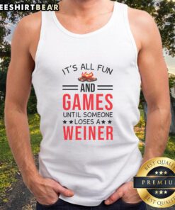 Awesome gamer camping in a fun setting, wearing 'It's All Fun and Games Until Someone Loses a Wiener' tank top.