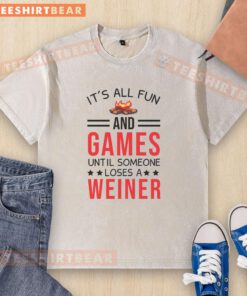 Awesome gamer camping t-shirt featuring a fun design: 'It's all fun and games until someone loses a weiner.'