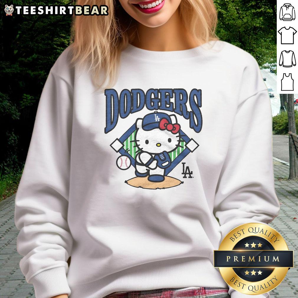 Awesome Hello Kitty x Los Angeles Dodgers first pitch sweatshirt featuring playful design and vibrant team colors.