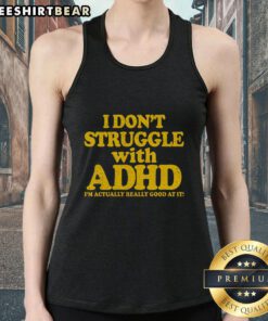 Woman wearing 'I Don't Struggle with ADHD, I'm Actually Really Good at It' tank top, showcasing confidence and positivity.
