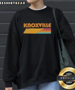 Cozy Awesome Knoxville Tennessee sweatshirt displayed on a wooden table, perfect for casual wear and showing local pride.