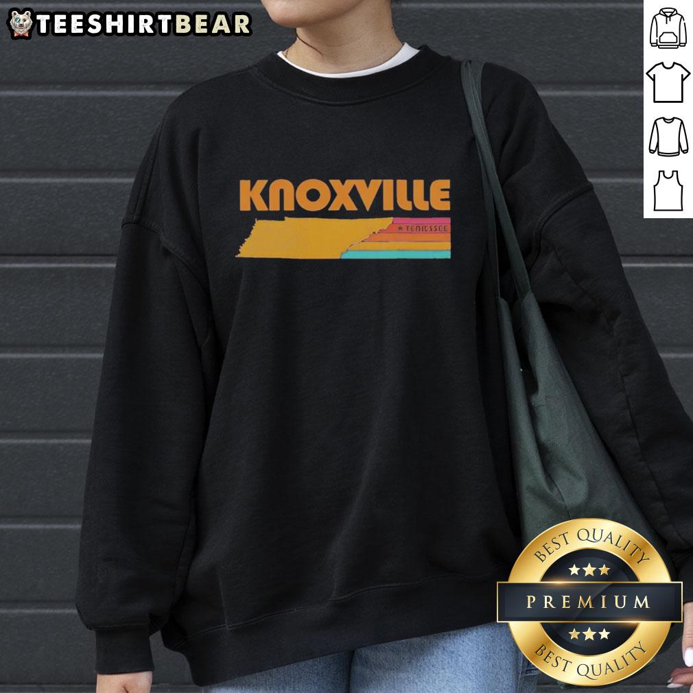 Cozy Awesome Knoxville Tennessee sweatshirt displayed on a wooden table, perfect for casual wear and showing local pride.