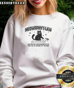 Awesome Meowrphy's Law sweatshirt featuring humorous quote 'Anything Can & Will Be Knocked Off The Table' design.