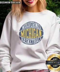 Awesome Michigan Wolverines basketball sweatshirt featuring vibrant team colors and logo, perfect for fans and athletes.