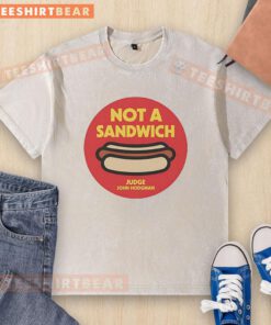 Alt Text: Awesome Not A Sandwich Judge John Hodgman logo on a washed t-shirt, perfect for fans of the popular podcast.