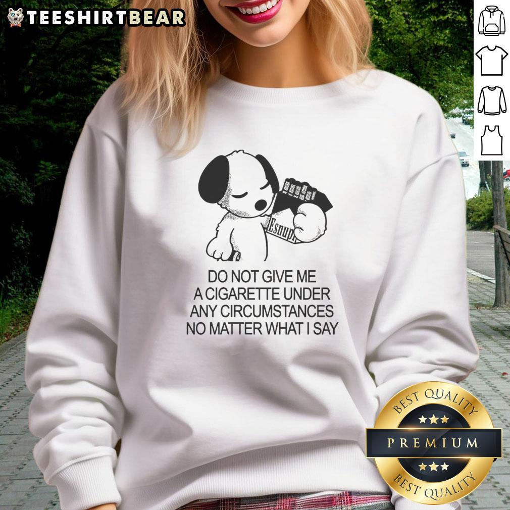Cute Snoopy holding a cigarette on a 'Do Not Give Me A Cigarette' sweatshirt, perfect for dog lovers and Peanuts fans.