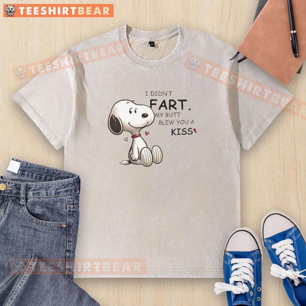 Alt Text: Cute Snoopy I Didn't Fart My Butt Blew You A Kiss T-Shirt design featuring a playful cartoon Snoopy graphic.