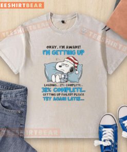 Cute Snoopy graphic on a washed t-shirt, with Okay, I'm awake. Loading... Failed. Try again later text.