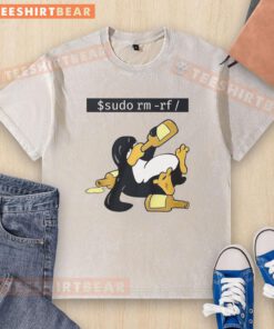 Alt Text: Funny Linux Tux graphic on a washed t-shirt featuring the command 'sudo rm -rf', perfect for tech enthusiasts.
