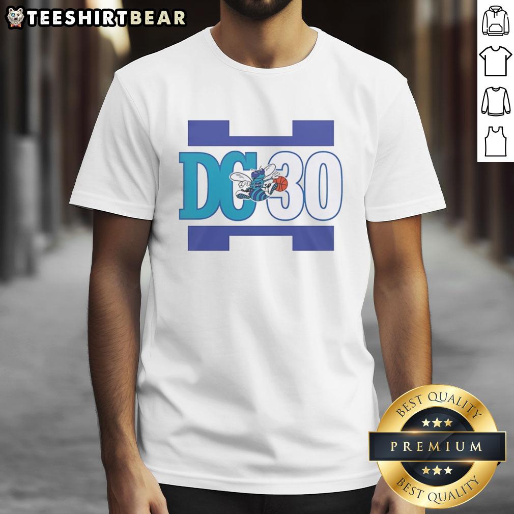 Good Charlotte Hornets Curry DC 30 T-Shirt featuring vibrant colors and iconic logo, perfect for sports fans and collectors.