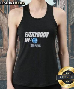 Orlando Magic fans in tank tops celebrate during the 2026 NBA Playoffs, showcasing team spirit and excitement.