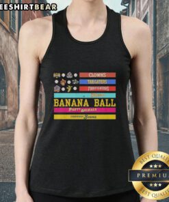 Good Savannah Bananas clowns and firefighters tailgating in American flag tank tops at a lively baseball game.