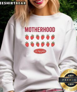 Good Strawberry Motherhood Is My Jam Sweatshirt featuring a playful design perfect for moms who love strawberries.