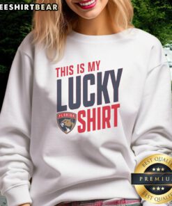 Person wearing a Florida Panthers sweatshirt, showcasing team spirit and luck for game day in vibrant colors.
