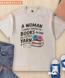 Funny washed t-shirt design: 'A woman cannot survive on books alone, she also needs yarn' for book and yarn lovers.