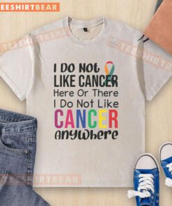 Motivational anti-cancer quote on a washed t-shirt, promoting awareness and positivity against cancer struggles.