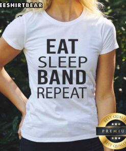Nice band Eat Sleep Repeat musician marching ladies tee design featuring vibrant graphics and stylish typography.